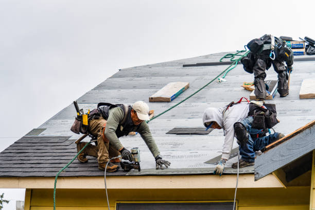 Professional Roofing technician working in North Conway, NH